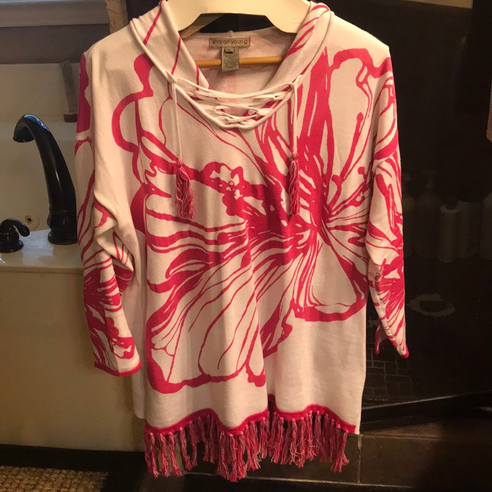 sharon young pink and white hooded sweatshirt